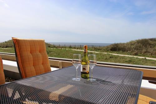 Erkély/terasz, Appartementen met uniek zeezicht in Egmond aan Zee