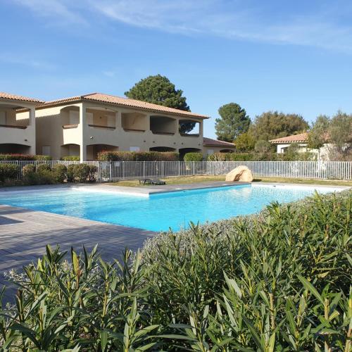 Rez De Jardin CLIMATISE - 2 MIN PLAGE - PISCINE - Location saisonnière - Lecci