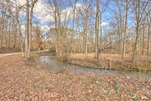 Creek-View Getaway with Deck, Yard, and Fire Pit!