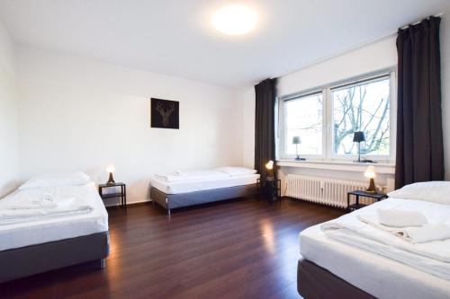 RAJ Living - 1 , 3 and 4 Room Apartments - 20 min Messe DUS & Airport DUS