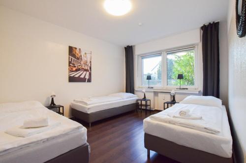 RAJ Living - 1 , 3 and 4 Room Apartments - 20 min Messe DUS & Airport DUS