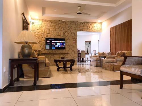 ห้องส่วนกลางสำหรับนั่งเล่น/ดูทีวี, Morgah Resort Villas in มอร์กาห์