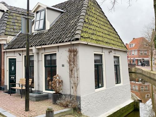 Wetterhuske - Huisje aan de gracht