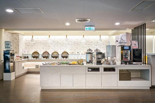 Đồ ăn và thức uống, Ho Fong Business Stay in Quận Fongyuan