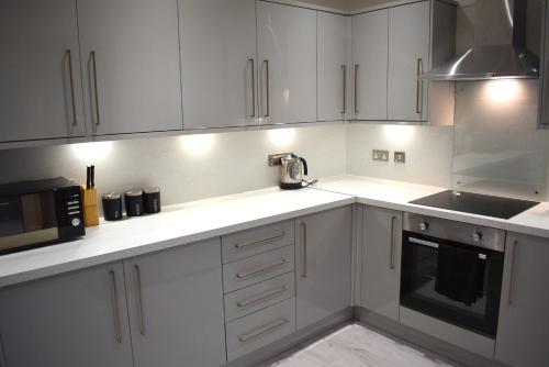 Konyha, Kelpies Serviced Apartments- Russell in North Broomage