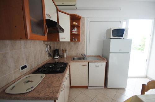 Apartment in Stara Novalja with sea view, loggia, air conditioning, WiFi (183-2)