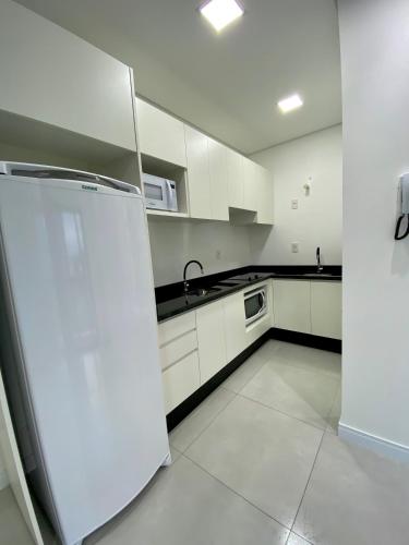 Loft no centro com Smart Tv, Ar e cozinha