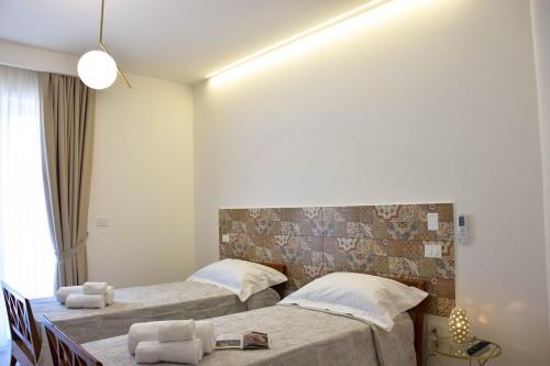 Accomodati - Camere e Appartamenti