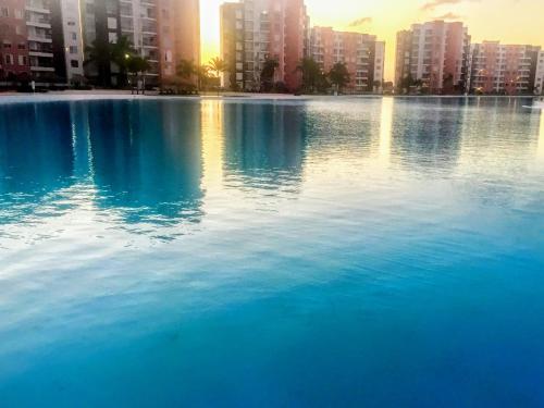Pilarita's Big Terrace Lagoon Front Equipped 3BR GF WiFi 7 Pools