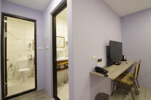 ห้องส่วนกลางสำหรับนั่งเล่น/ดูทีวี, WE Hotel in เหมียวลี่