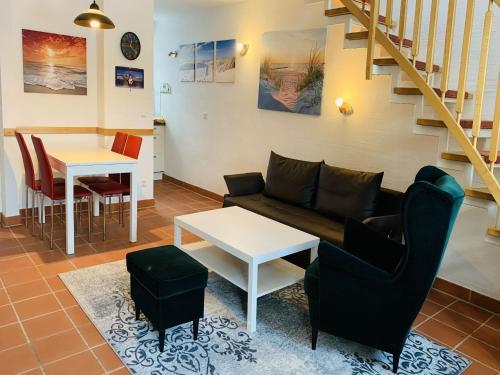 Feriendorf Rugana - Komfort Appartement mit 2 Schlafzimmern und Terrasse D22 in Dranske, Deutschland