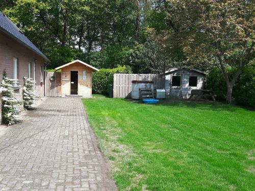 Rural holiday home in Vessem with a sauna
