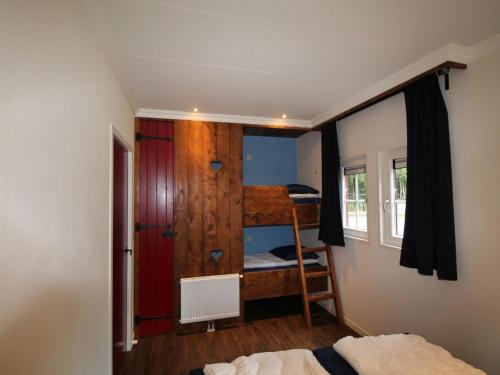 Designed home with bedstead surrounded by forest - main image