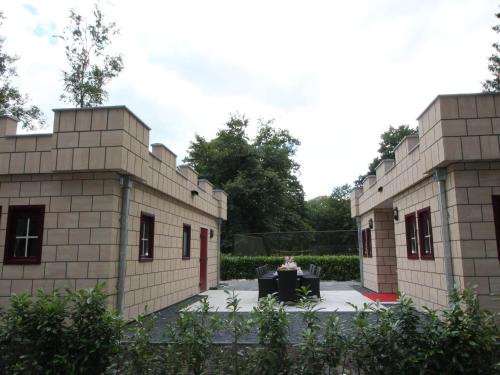 Designed home with bedstead surrounded by forest - image 6