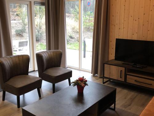 Modern chalet with a dishwasher located in nature - image 2