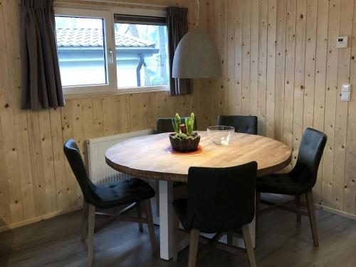 Modern chalet with a dishwasher located in nature - image 3