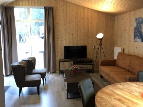 Modern chalet with a dishwasher located in nature - image 11