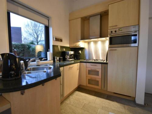 Kitchen, Lavish Villa in Kamperland with Garden in Kamperland