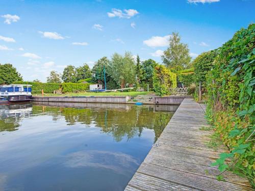 Detached house on the water with jetty in Langweer Frl