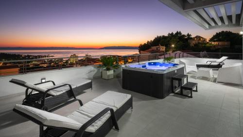Four-Bedroom Villa with Terrace and Sea View