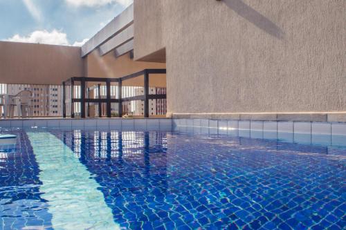 Guara Inn Flat Service in กวาราตินกิวต้า