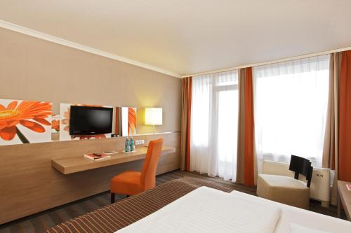 H4 Hotel Frankfurt Messe - image 5
