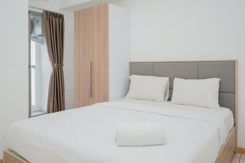 Cozy Living 2BR at M-Town Residence Apartment By Travelio