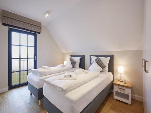 Reetland am Meer Luxus Reetdachvilla mit 3 Schlafzimmern Sauna und Kamin - image 3