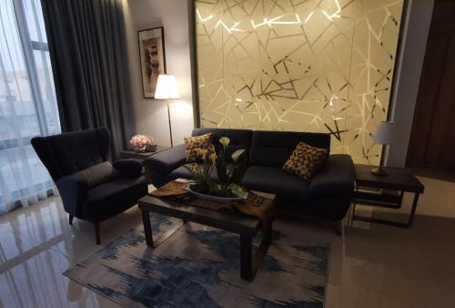 Shared lounge/TV area, اجنحة بياسة Baeza Suites in Ar Rabwah
