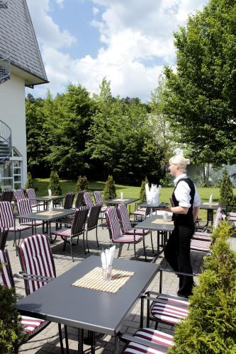 ระเบียง/ชานเรือน, H+ Hotel Wiesbaden Niedernhausen in นีเดอร์เฮาเซน