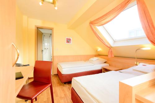 Dreibettzimmer