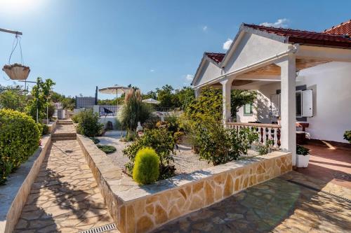 Dārzs, House Camellia with fenced pool and playground in Bristivica