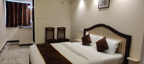 Rmc travellers inn – Chennai, IL