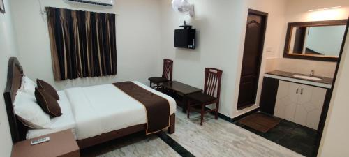 Rmc travellers inn – Chennai, IL