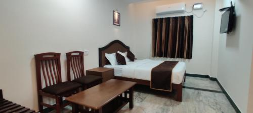 Rmc travellers inn – Chennai, IL