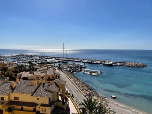 Sunrise Beachfront Apartment by the Marina