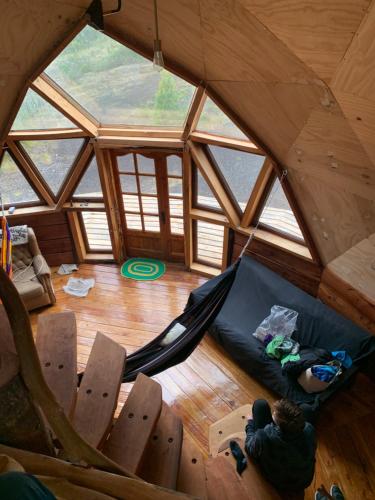 Domo Conguillio Conecta con tu energía sagrada junto al Salto Truful Truful con una vista majestuosa que podrás disfrutar en una tinaja Una experiencia que alineará tu espíritu y tu energía interior Vívelo