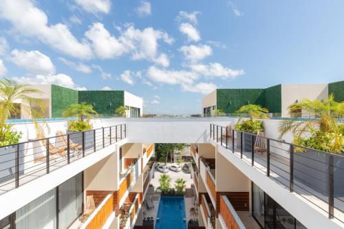 Aldea Zama 2BR condo with rooftop terrace and pool