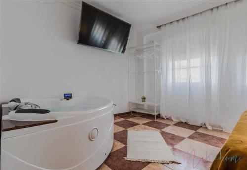 Suite con jacuzzi en el centro vistas y garaje