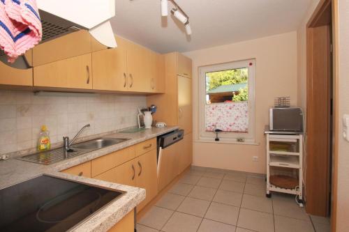 Konyha, Ferienhaus Kormoran Haus - Terrasse, Garten, am Wasser in Breege