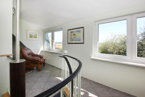 Ferienhaus Kormoran Haus - Terrasse, Garten, am Wasser in Breege