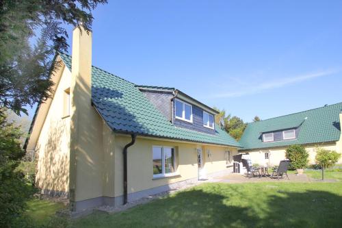 Bejárat, Ferienhaus Kormoran Haus - Terrasse, Garten, am Wasser in Breege