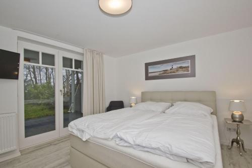 moderne Ferienwohnung mit Sauna und Terrasse - Ferienresidenz Zwei Bodden 112 66m von Lietzow entfernt