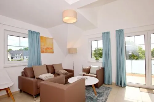 Strandresort Rex Rugia Ferienwohnung 11-7 mit Sauna- und Schwimmbadnutzung im AHOI Sellin in Lobbe, Deutschland