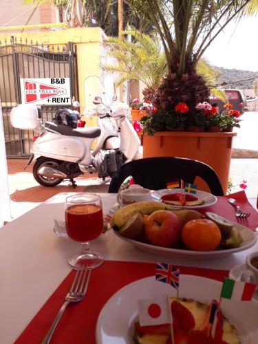 . Hotel Villarosa con Vespa Rent