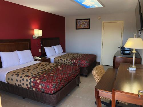 Econo Lodge - Tap to explore photos