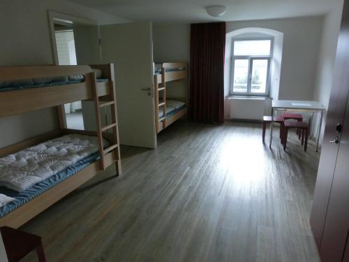 Single Bed in Male Dormitory Room