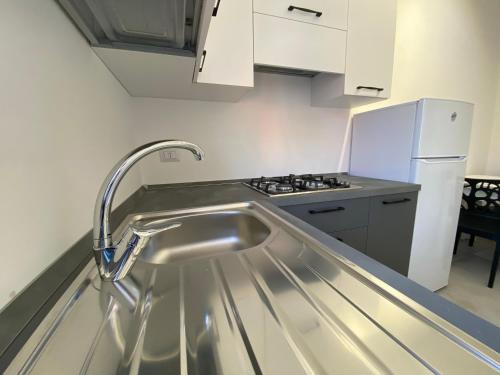 廚房, Cattleya Holidays Apartment in 波爾托切薩雷奧市中心