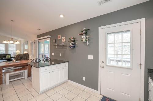 Pet friendly home with a large fenced-in backyard nestled in the heart of Oak Island
