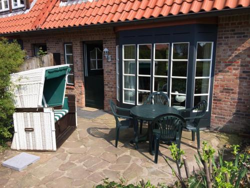 Balcony/terrace, Ferienhauser im Sylter Gartenweg in Tinnum